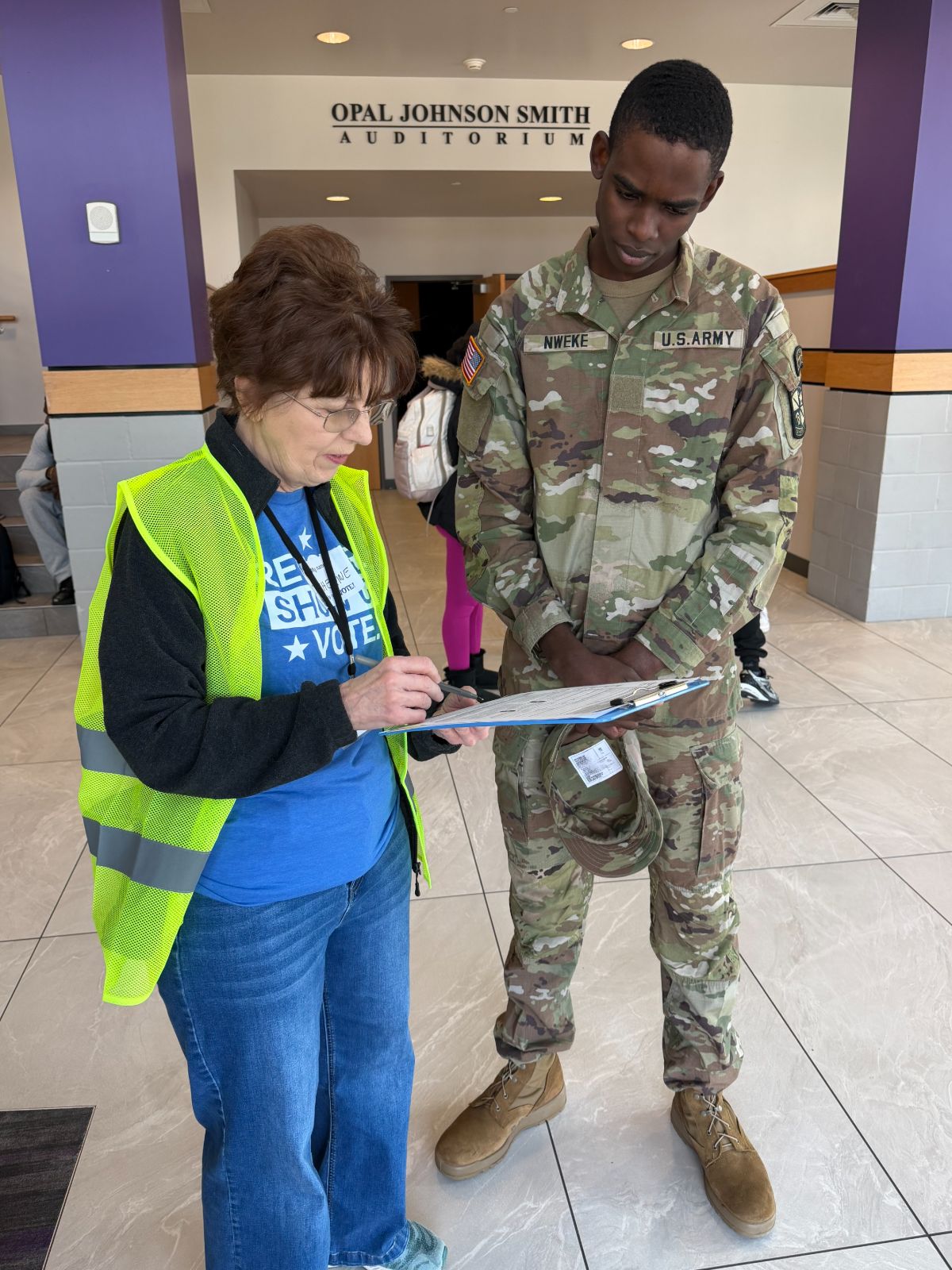 PxP volunteer registering a student voter.