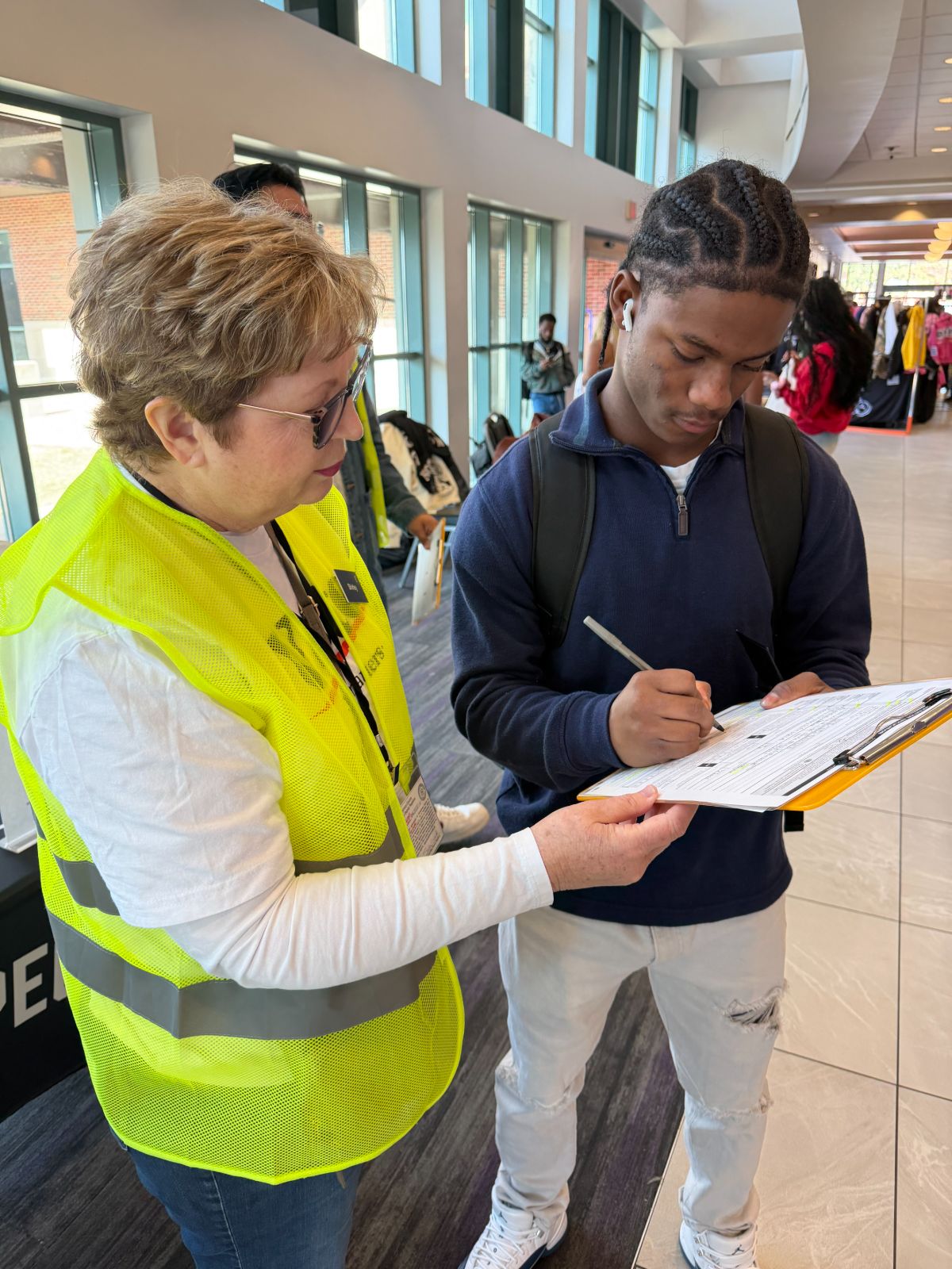 PxP volunteer registering a student voter.