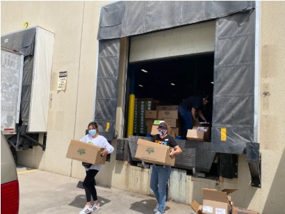 Powered by People volunteers at the El Paso food bank in 2020.