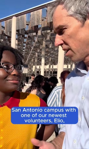 Beto talking to Elio, Volunteer Deputy Registrar for Powered by People